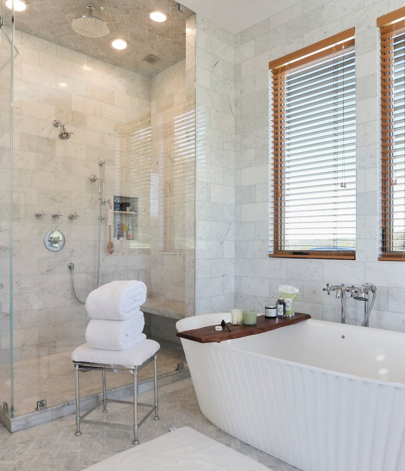 Naturally lit freestanding tub with a dream-of-a-shower right here in Fauquier County, Virginia